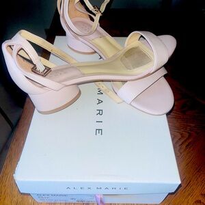 Low heel strapped sandal.  Color nude pink,  women size 8.